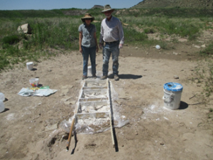Stan Bryant and wife in front of plaster mother mold